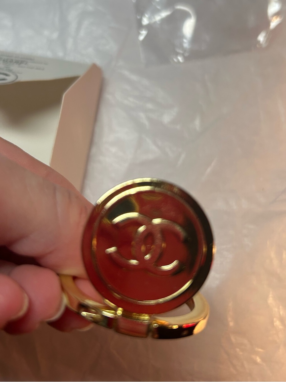 Chanel phone holder, sticks to the back of your phone!! NIP/NWT